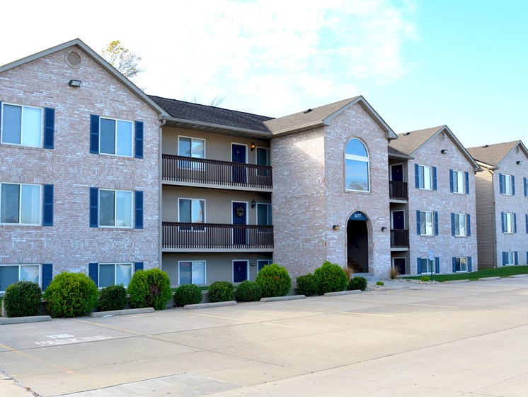 Cantwell crossing three story apartment buildings with exterior entry